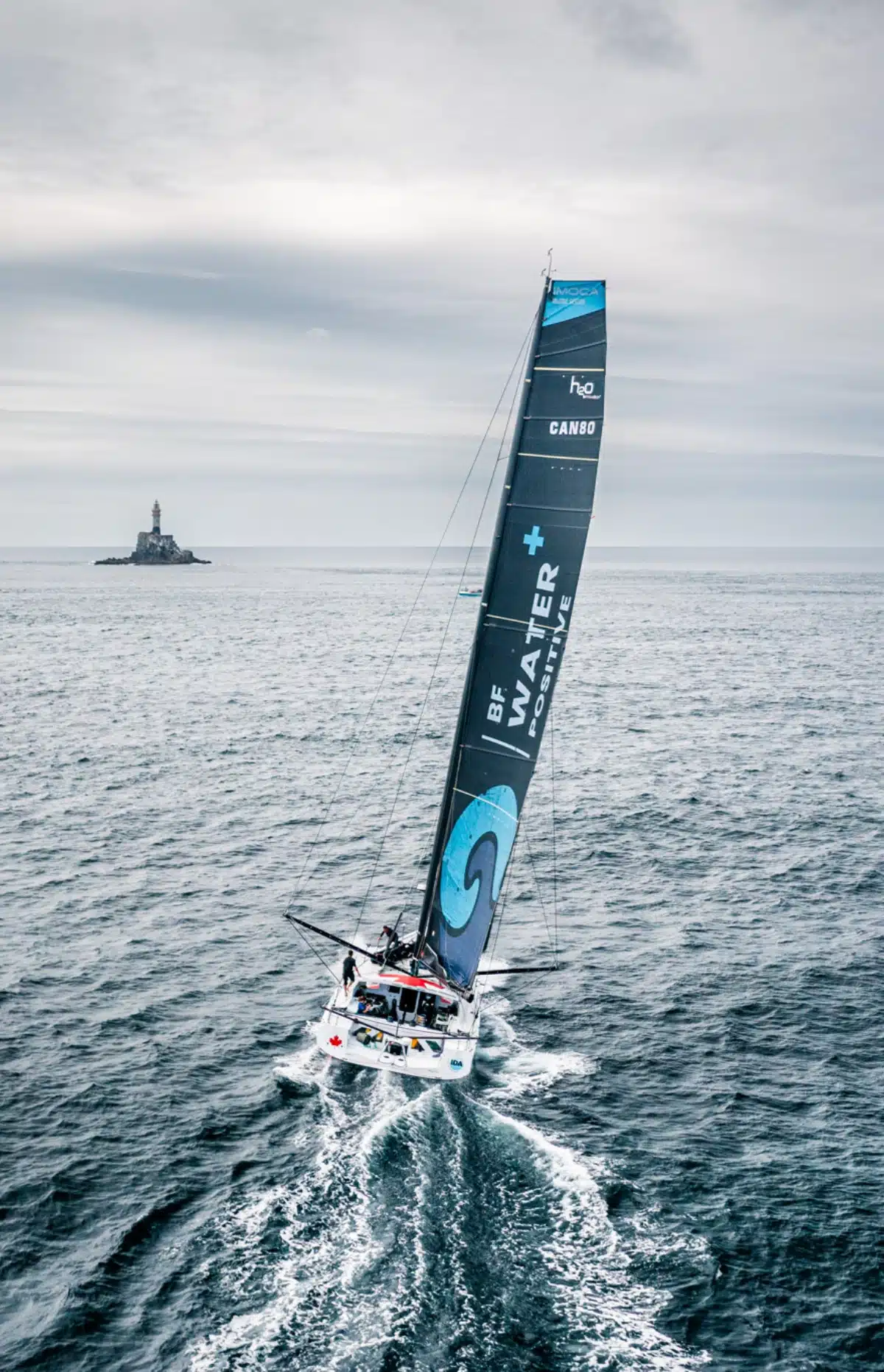 Be Water Positive Canada Ocean Racing yacht sailing away